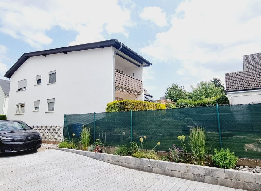 Limburg-Eschhofen: Eigentumswohnung mit Balkon, Garten und Garage