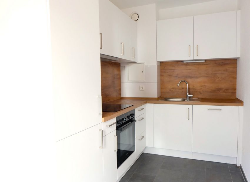 Lage Lage Lage! 2 Zimmer Wohnung mit großem Balkon und TG-Stellplatz direkt am Main.