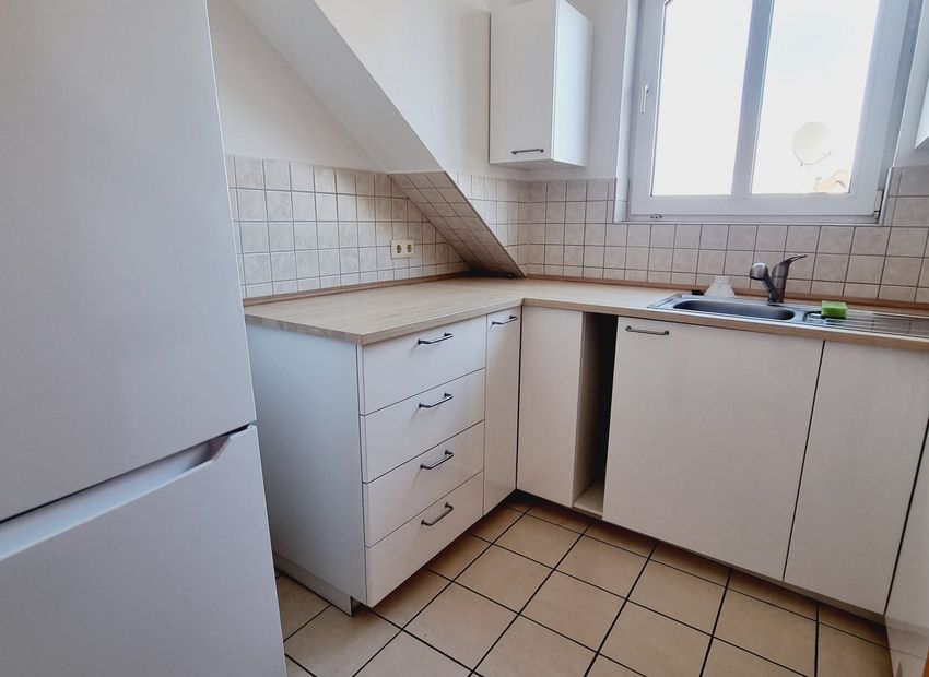 Höhr Grenzhausen: Eigentumswohnung (DG) mit Balkon und PKW-Stellplatz