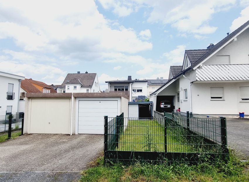 Limburg-Eschhofen: Eigentumswohnung mit Balkon, Garten und Garage
